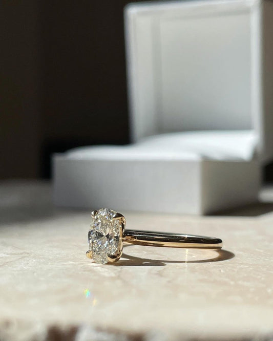 3ct Oval Solitaire Round Gold Band Lab Grown Diamond Ring  Classic  diamond solitaire on a sleek gold band, highlighted on a manicured hand, perfect for wedding and engagement themes. diamond ring, gold engagement ring, luxury bridal jewelry, wedding accessories YouTube Amazon Facebook Weather Google Gmail Wordless WhatsApp Web Translate News blog post ring ceremony Article Life Money 2025 design Ring Ceremony Diamond Shape Diamond Ring Surat Diamond India Market Diamond Ring for Her Diamond Ring for Men 